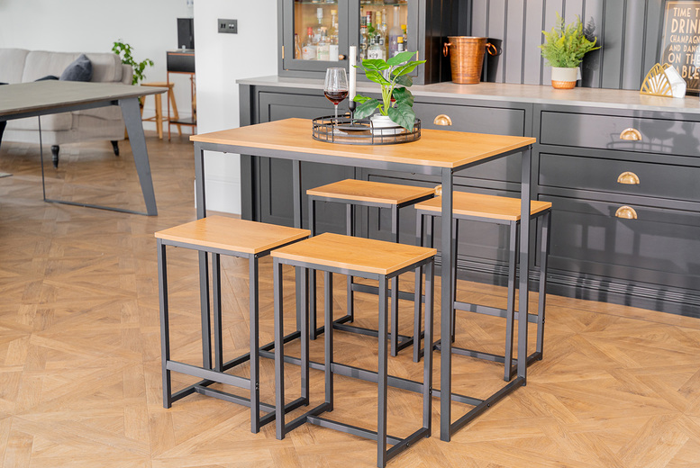 £122 instead of £439.99 for a modern bar table with four chairs from Tudor Furniture – save 72% £122 instead of £439.99 for a modern bar table with four chairs from Tudor Furniture – save 72%