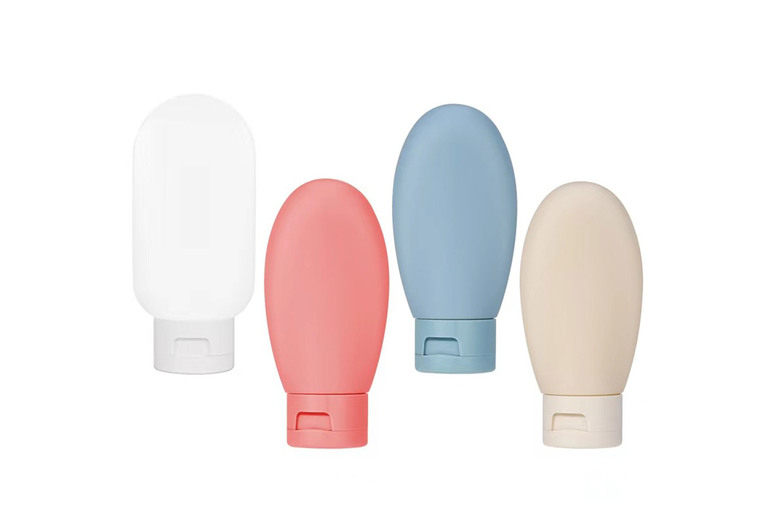 Set of 4 60ml Mini Travel Bottles – Perfect for Beauty Essentials | Wowcher