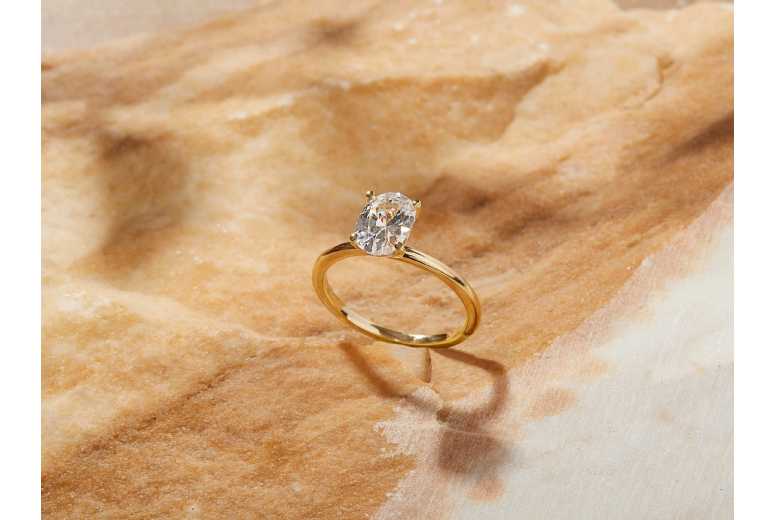 1.00ct D/VVS1 Oval Moissanite Solitaire Engagement Ring in Gold-Plated Setting | Wowcher