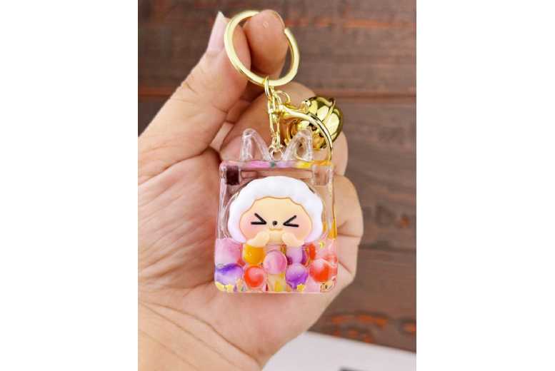 Unisex Black Eco-Friendly Quicksand Keychain – Colourful Bubble Bead Accessory | Wowcher Unisex Black Eco-Friendly Quicksand Keychain – Colourful Bubble Bead Accessory | Wowcher