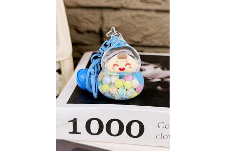 Unisex Black Creative ABS Keychain Quicksand Dolls – Colourful Accessory Charm | Wowcher